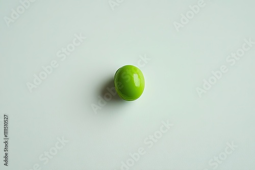 Wallpaper Mural Minimalistic a single green pea on a solid white background Torontodigital.ca