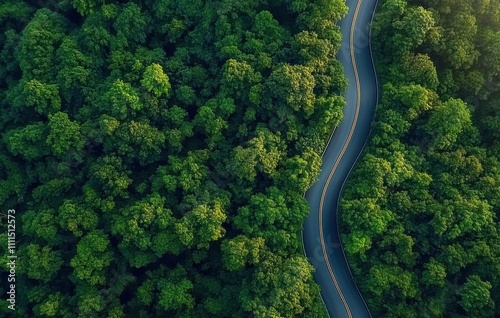 Aerial view of hydrogen energy truck on highway through green forest for sustainable transport and zero emission delivery