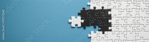 A partially completed jigsaw puzzle with a missing black piece against a blue background, symbolizing the concept of completion and the search for solutions.