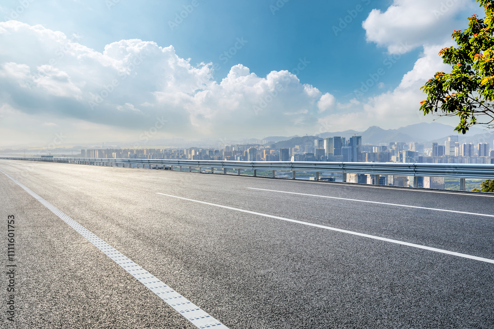 Fototapeta premium Asphalt highway road and city skyline with modern buildings scenery in Shenzhen. Outdoor road background.