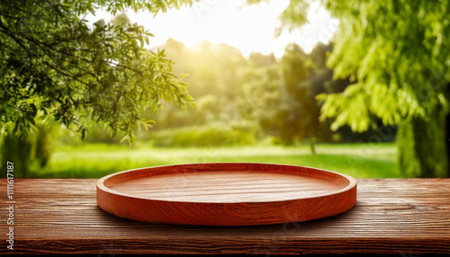 empty wooden tray on table with tree in background. presentation products