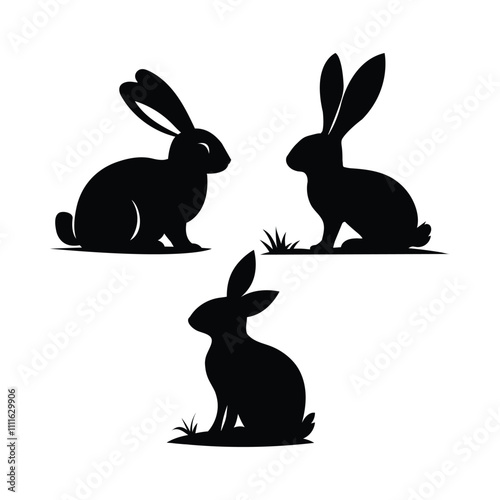 Silhouette of Three Bunnies on Grass