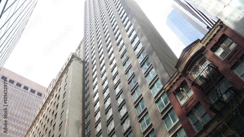 Fototapeta premium New York City Lower Manhattan, Downtown Financial District architecture, United States. High-rise skyscrapers, residential and office buildings, USA. American urban street, real estate, realty in NYC.