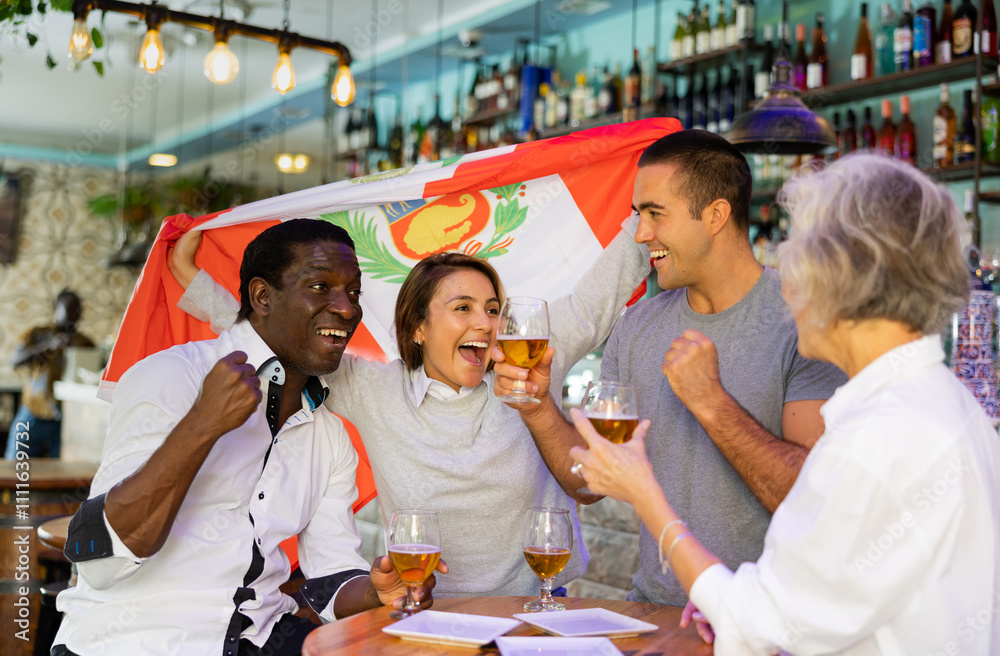 Obraz premium Happy sport fans holding flag of Peru, celebrating victory of national team, drinking alcoholic drinks in beer pub