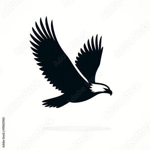 Silhouette of a soaring eagle in flight.