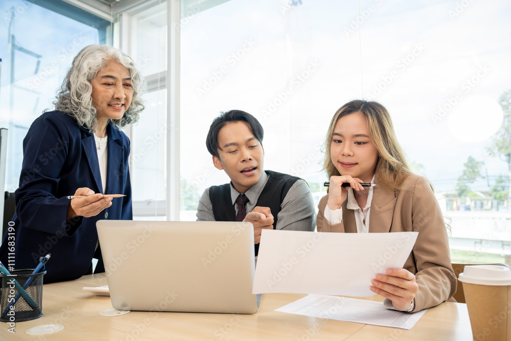 Executives are having a meeting with employees to discuss business planning in a conference room. Executives are having a meeting with employees to discuss business planning in a conference room.