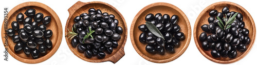 A wooden bowl filled with black olives in olive oil, top view