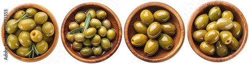 A wooden bowl filled with green olives in olive oil, top view