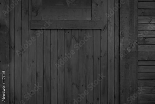 Black wooden board tetxure. Grunge timber wallpaper photo