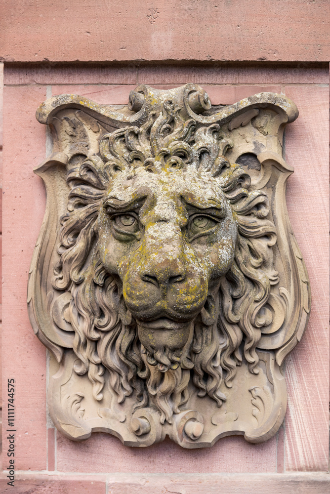 Lion's head statue on the exterior of the Heidelberg castle, Heidelberg, Germany Lion's head statue on the exterior of the Heidelberg castle, Heidelberg, Germany