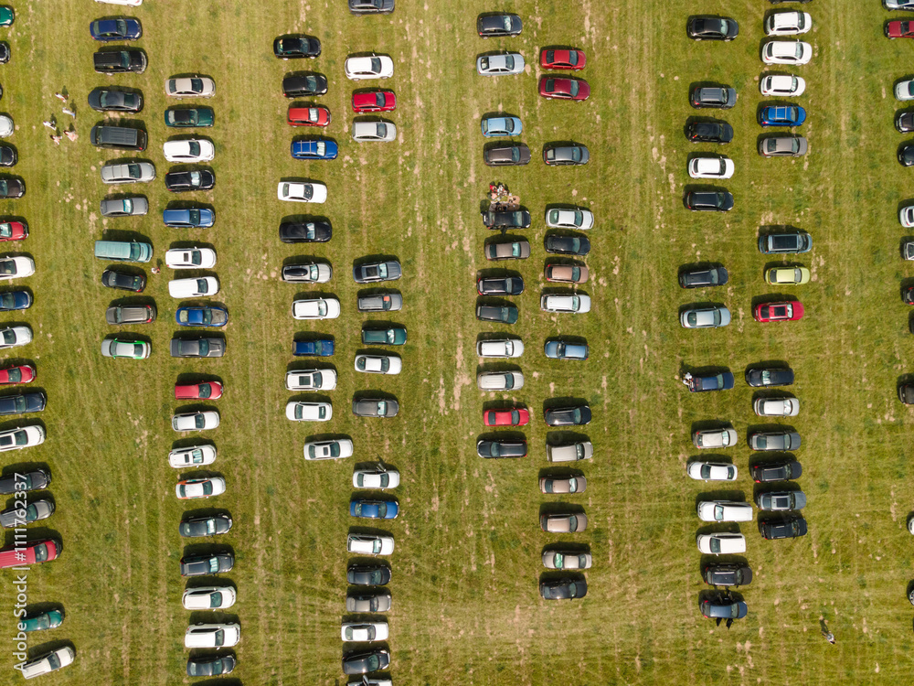 Obraz premium Top view Green field and parking for cars