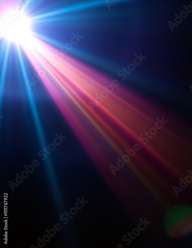 Colorful light rays bursting through darkness with blue and pink beams creating dramatic effect