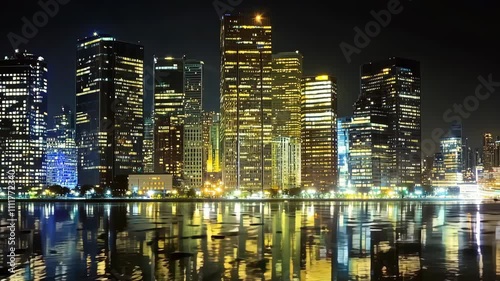 Night Cityscape with Golden Illuminated Skyscrapers