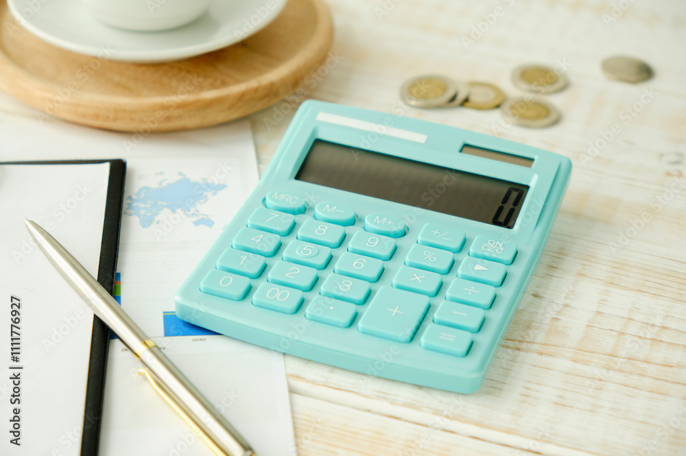 Office supplies with wallet and cup of coffee close up Office supplies with wallet and cup of coffee close up