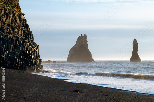 Wallpaper Mural Reynisfjara black sand beach in Iceland. Ocean cliffs. Sunny day. Seascape. Touristic place. Torontodigital.ca