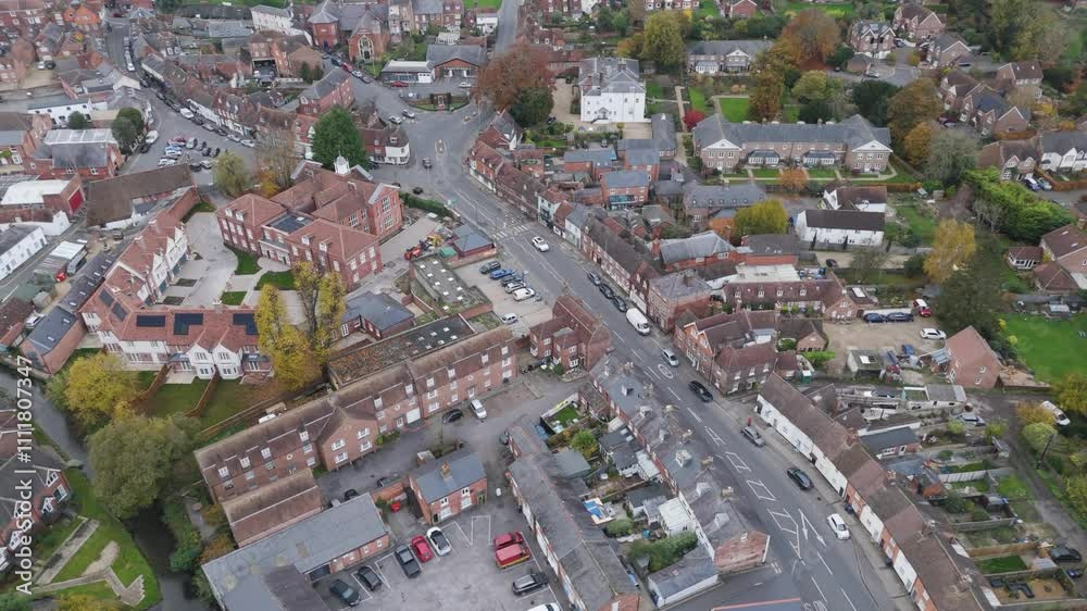 Aerial orbital view of London Road and the High Street in Marlborough, featuring bustling streets and historic architecture in the United Kingdom Aerial orbital view of London Road and the High Street in Marlborough, featuring bustling streets and historic architecture in the United Kingdom