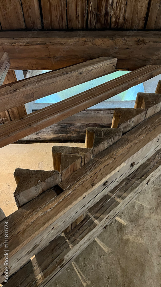 Antique wooden staircase with steps in the Medieval knight's castle, Siedlicin tower in Poland, Silesia. Antique wooden staircase with steps in the Medieval knight's castle, Siedlicin tower in Poland, Silesia.