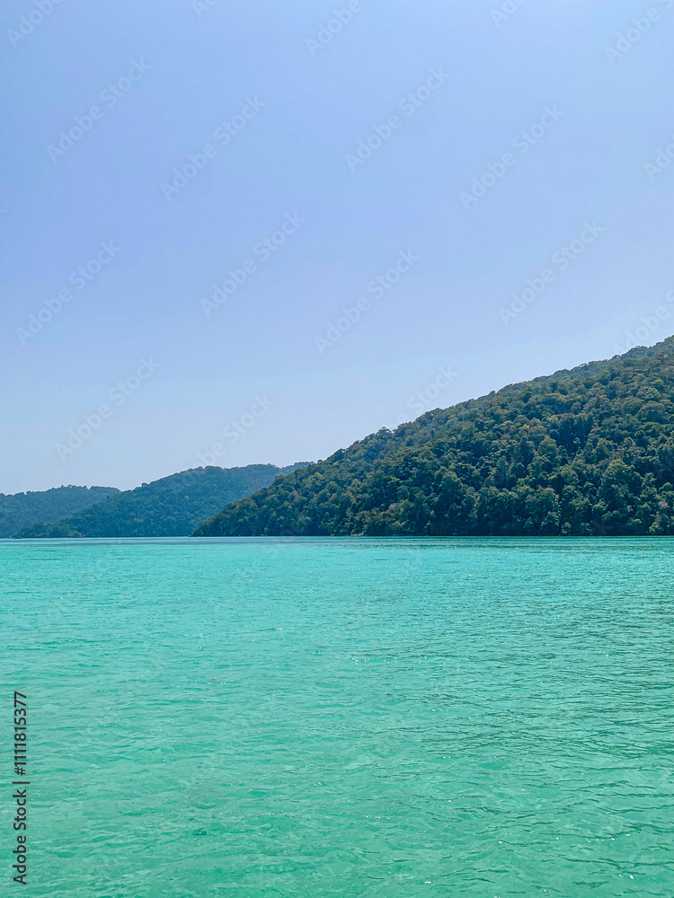 Snorkeling boat trip, panorama view of Koh Similan on a cliff edge and beach Snorkeling boat trip, panorama view of Koh Similan on a cliff edge and beach