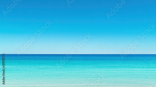Clear sky gradient from soft teal to deep sea blue in a tranquil coastal setting