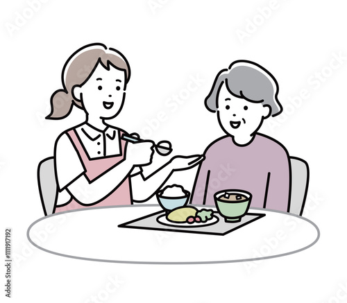 食事介助をする介護士とおばあさんのイラスト素材