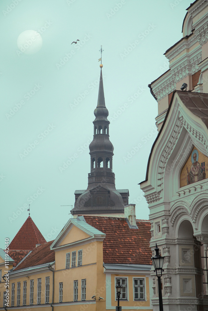 Fototapeta premium medieval winter Tallinn in the misty mystical light of the morning sun.