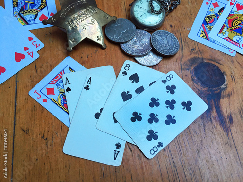 Dead man's hand . Aces and two Eights, named after Wild Bill Hickok who was killed with it in 1876.,Deadwood, Dakota Territory,, USA