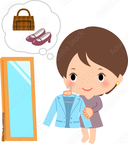 服のコーディネートを考えている女性