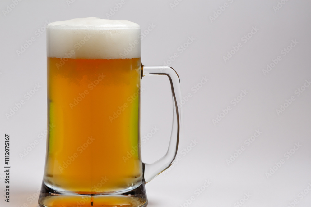 A glass of beer on a white background. A beer in a glass with a gray background. Glass beer gray background. A glass of beer with a lifestyle gray background. A glass of beer on a white background. A beer in a glass with a gray background. Glass beer gray background. A glass of beer with a lifestyle gray background.