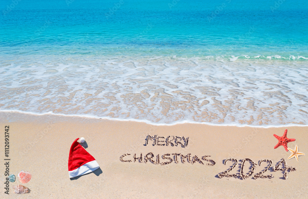 Fototapeta premium Merry Christmas 2024 at the beach