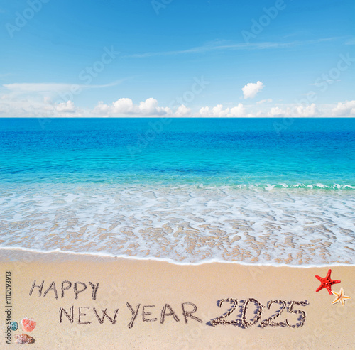 Obraz na płótnie happy new year 2025 written in the sand w salonie