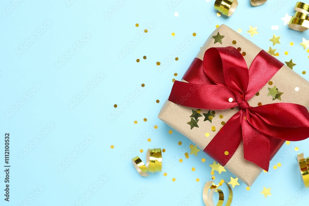 Beautiful gift box tied with bow on color background Beautiful gift box tied with bow on color background