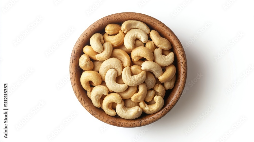 Fresh and Natural Cashew Nuts in Wooden Bowl on White Background Fresh and Natural Cashew Nuts in Wooden Bowl on White Background