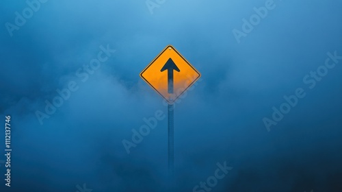 A solitary yellow traffic sign emerges through a dense fog, symbolizing direction and navigation in an atmospheric scene of mystery and uncertainty.