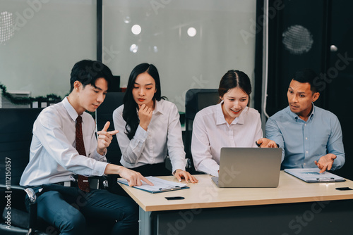 Entrepreneurs and business people conference in modern meeting room, happy multiracial coworkers have fun cooperating working together at office meeting, asian teamwork concept