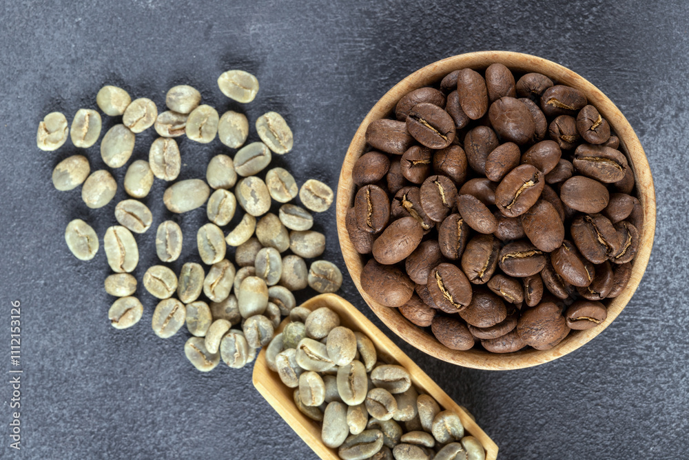 Green coffee with roasted coffee beans on gray background,closeup Green coffee with roasted coffee beans on gray background,closeup