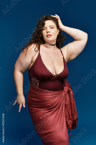 Young woman showcases her stylish outfit with confidence, radiating beauty and grace.