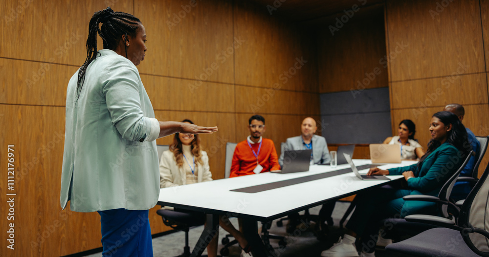 Diverse team in dynamic business meeting presentation Diverse team in dynamic business meeting presentation