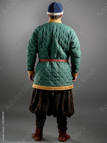 Historical fashion. Medieval knight cloth. Padded jacket gambeson. photo