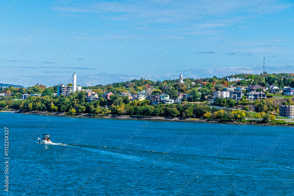 Fototapeta premium A view across the Saint Lawrence river towards the north side of the borough of Desjardins in Quebec city, Canada in the fall
