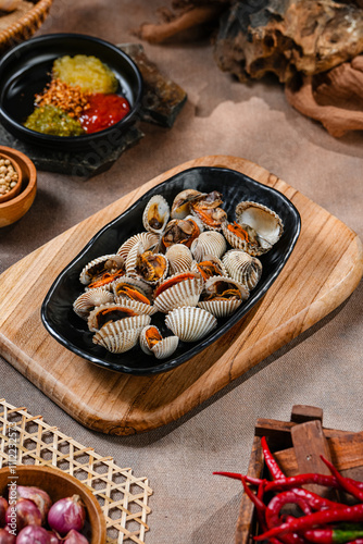 blood clams anadara granosa seafood served with sweet and sour pineapple sauce