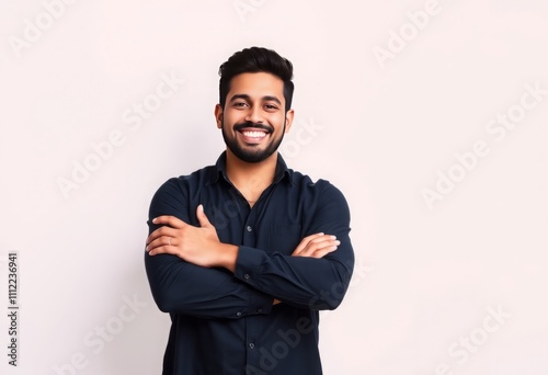 Handsome latin man standing over isolated background