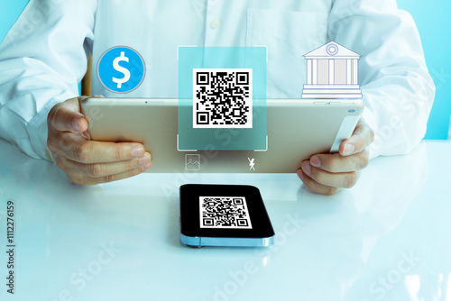 QR code on mobile phone screen, closeup. Unrecognizable businessman  holding modern tablet with bar code, paying for goods and services with payment system, creative image. digital money concept..