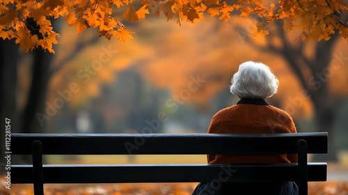 Autumn Reflection: Contemplating Life's Journey on a Park Bench photo