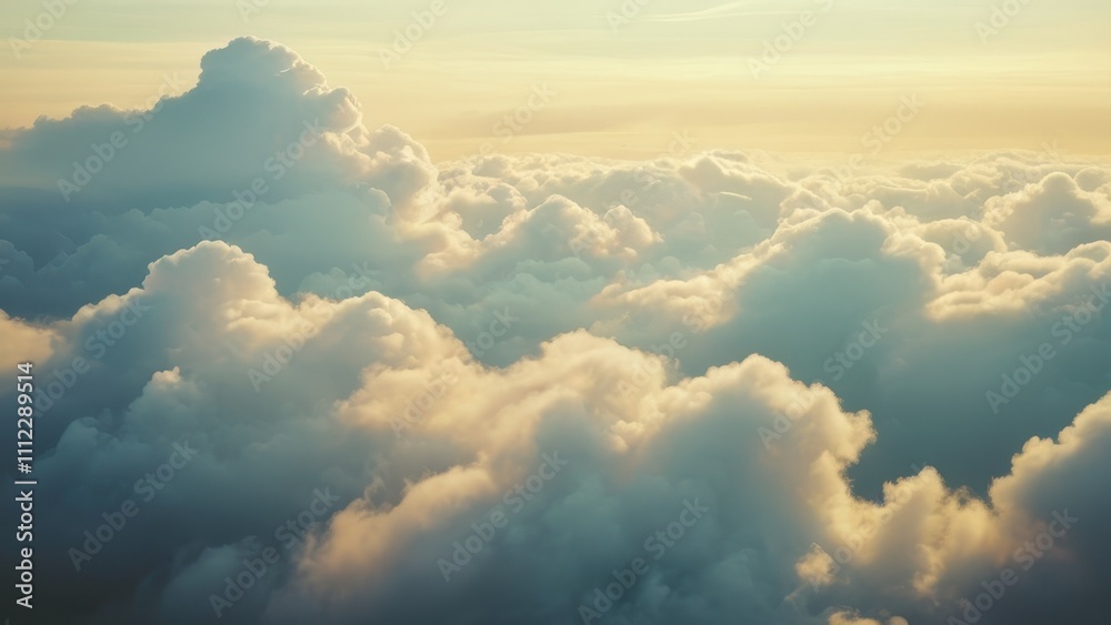 A serene sky filled with fluffy clouds and a mountain peak emerging through the mist A serene sky filled with fluffy clouds and a mountain peak emerging through the mist