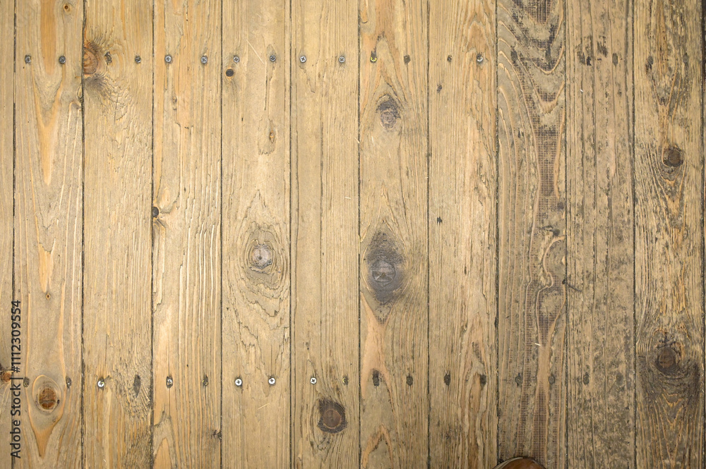 Fototapeta premium Textured background of vintage-style wooden boards with hammered nails and screws