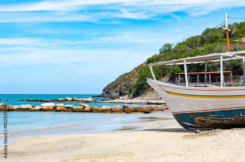 A beautiful beach with a large body of water and a lot of boats A beautiful beach with a large body of water and a lot of boats