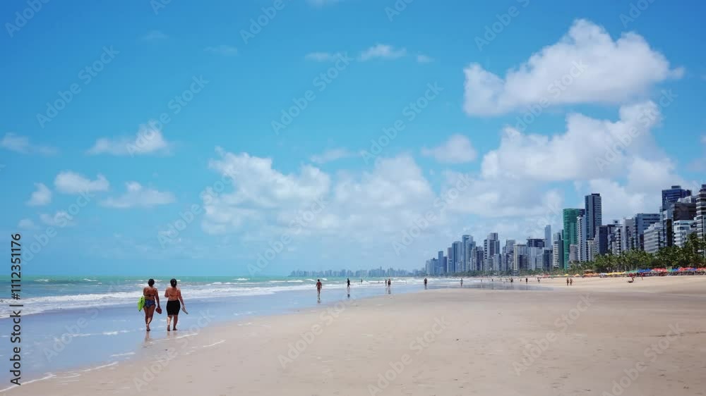 people walking on the Boa Viagem beach, Recife, Pernambuco, Brazil. people walking on the Boa Viagem beach, Recife, Pernambuco, Brazil.