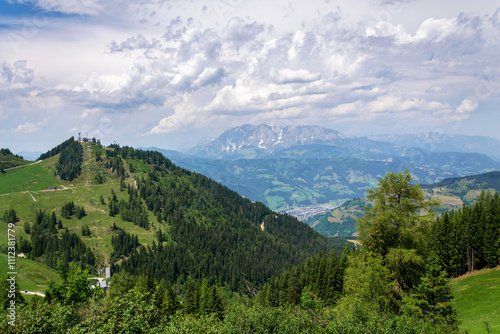 Cable car gondola on top of the Gernkogel Mountain from Sonntagskogel in Alps, Sankt Johann im Pongau district, Salzburg federal state, Austria, sunny summer day photo