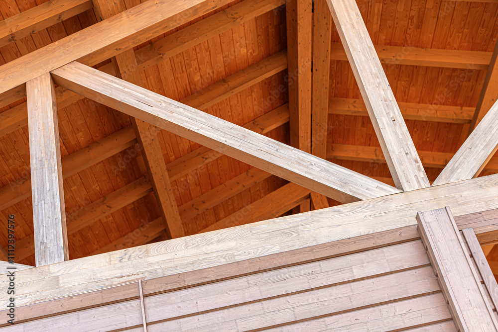Construction of a wooden roof of a frame house.