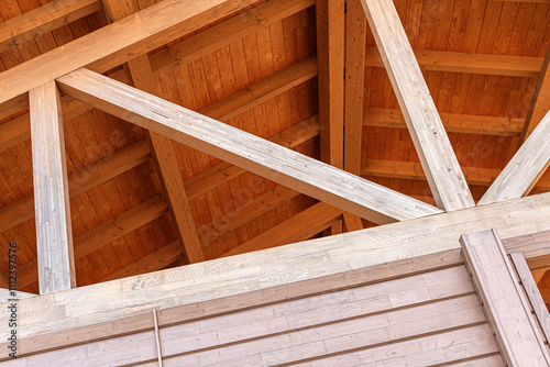 Obraz na płótnie Construction of a wooden roof of a frame house. w salonie